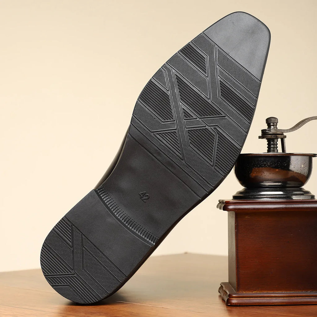 Brown retro men's formal shoes with side zip, square toe, and a low square heel on a plain background.