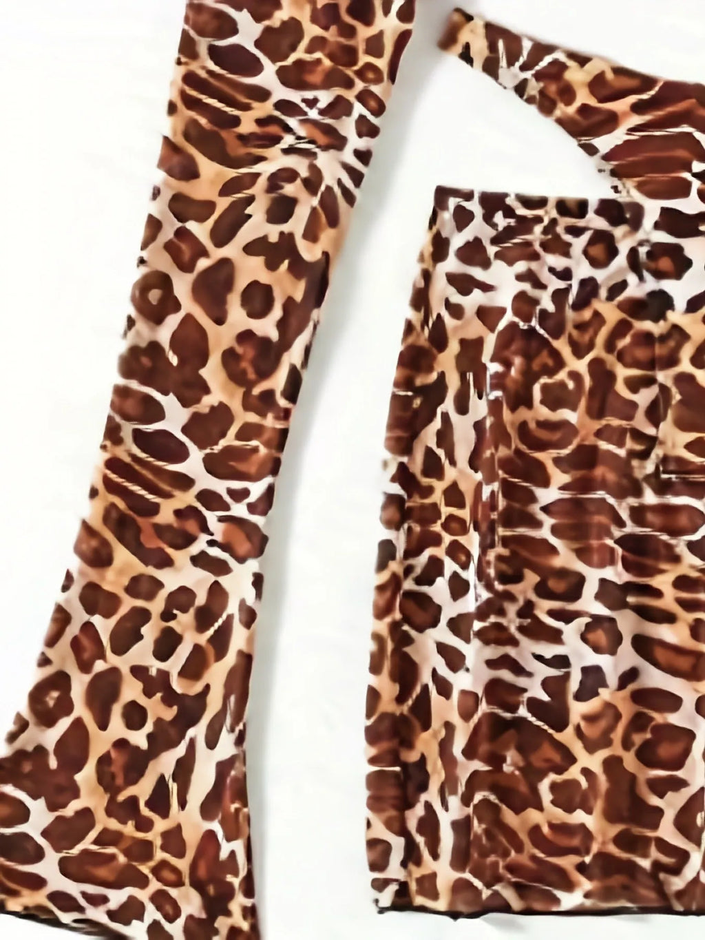 Women's leopard print bikini swimsuit set with matching skirt in split design