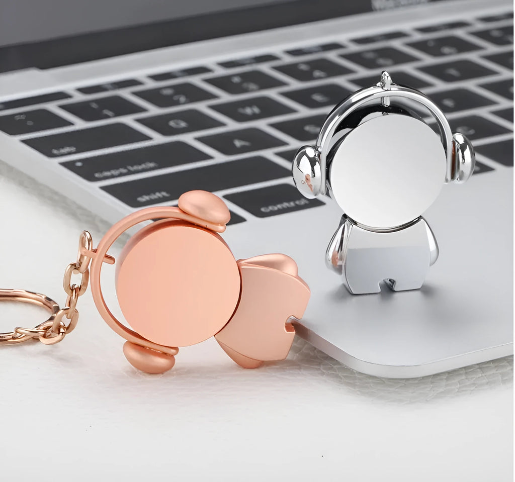Personalised silver metal USB flash drive shaped like a car with a cartoon musician design.