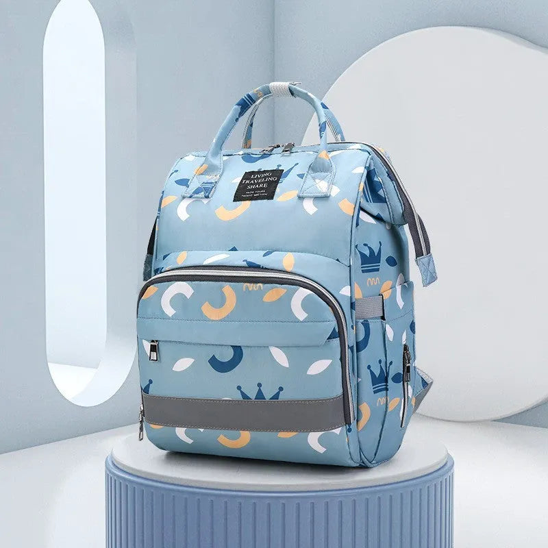 Oxford fabric mummy bag in geometric pattern, square vertical shape, 40x25x17cm, with outer pocket and double shoulder straps