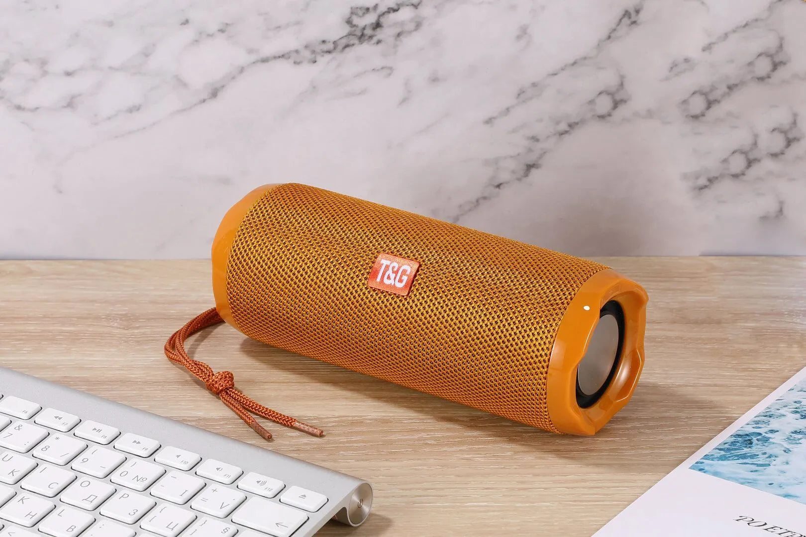 A rectangular portable Bluetooth speaker in multiple colours with a visible card slot on its side.