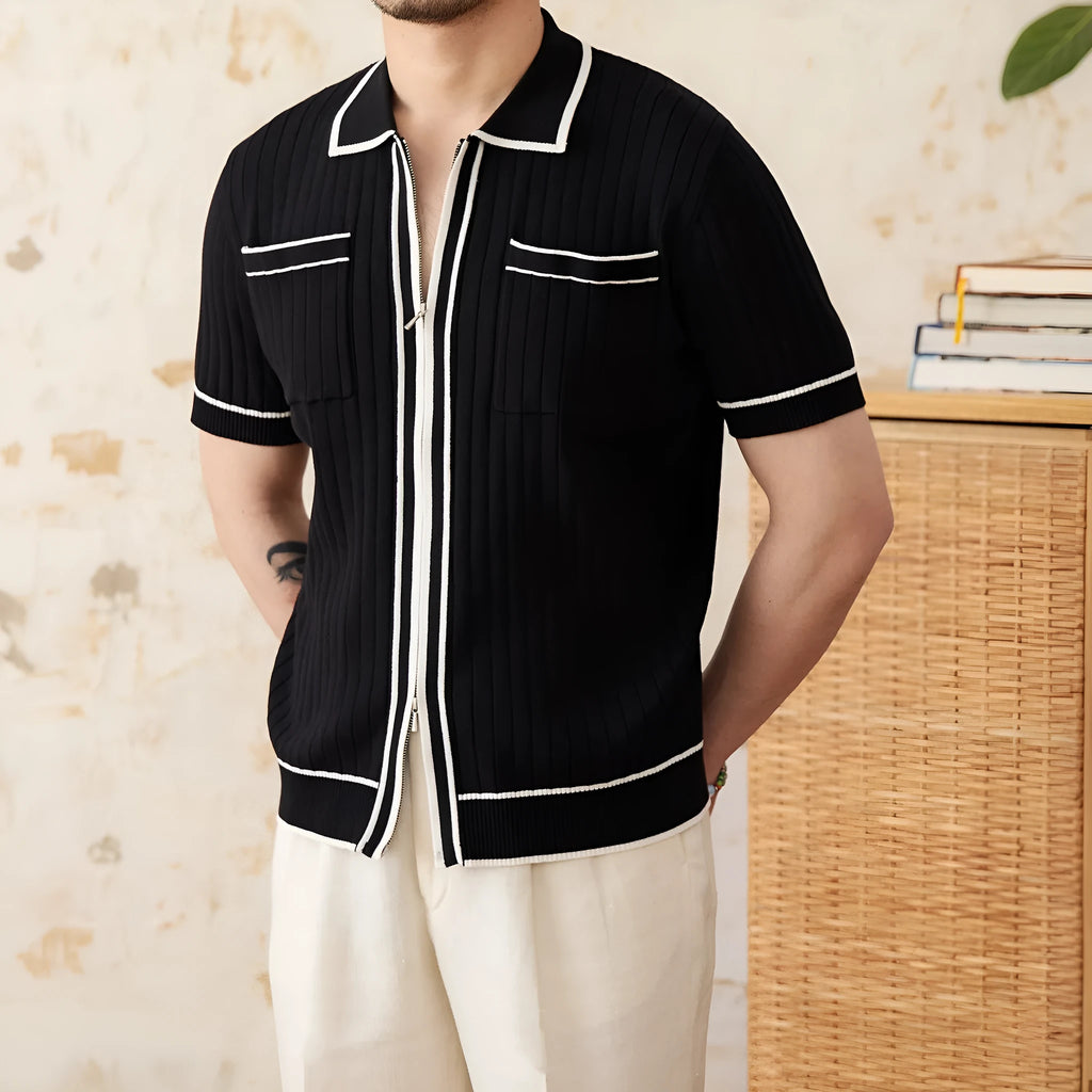 Slim black elastic knit polo shirt with a lapel collar and short sleeves on a hanger.