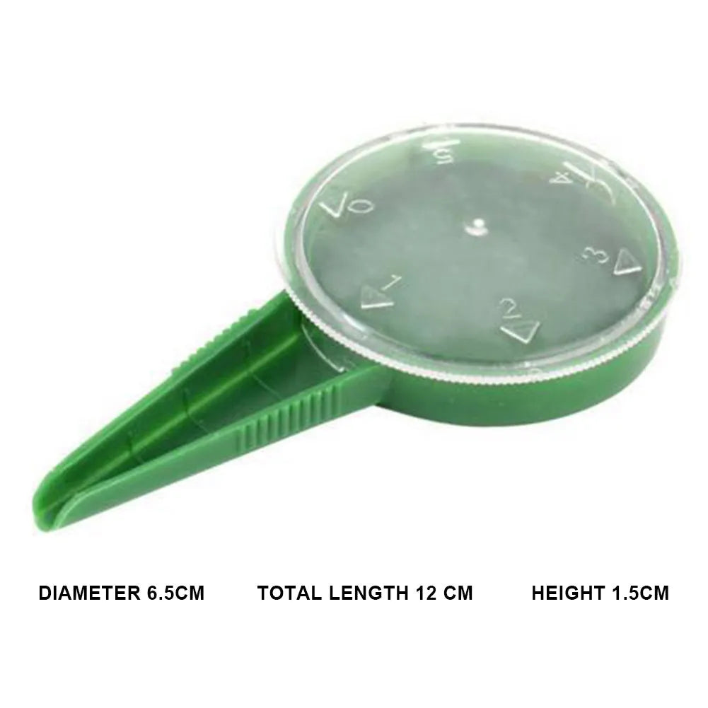 5-speed adjustable dial seed sower in transparent green plastic, approx 12cm long