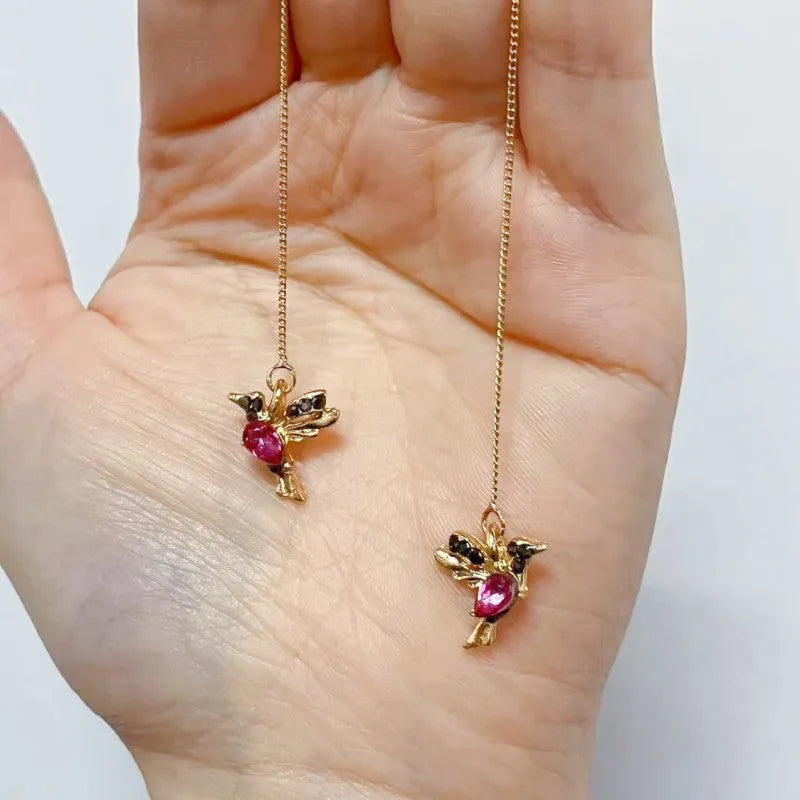Bird hanging long style earrings with mixed zirconium wing design in alloy construction