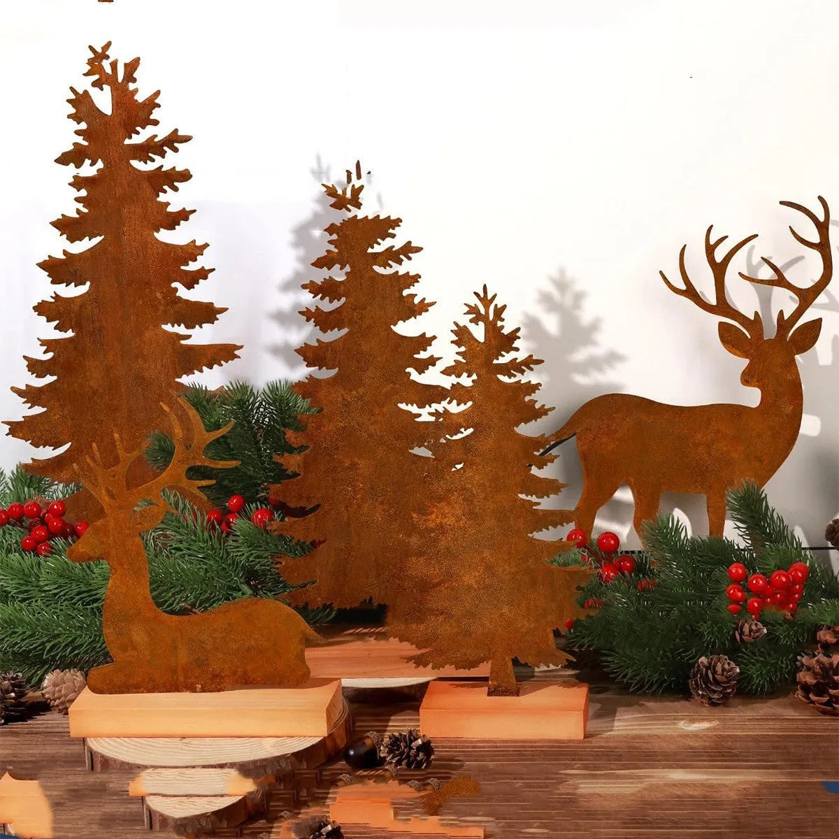 Three rusty metal elk Christmas tree ornaments with American-style design on green branches