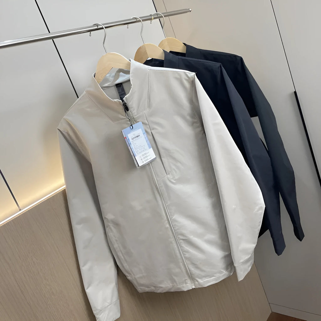 Man wearing a stand collar straight hem casual sports jacket in polyester fabric.