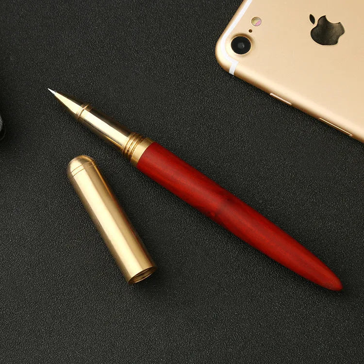 Brass and sandalwood signature pen showing wood grain and metal details at 14cm length