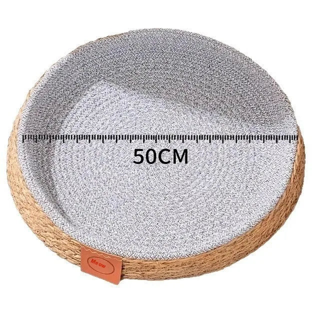 Woven rattan cat nest pet bed in a natural colour, shown in a size suitable for a medium cat.