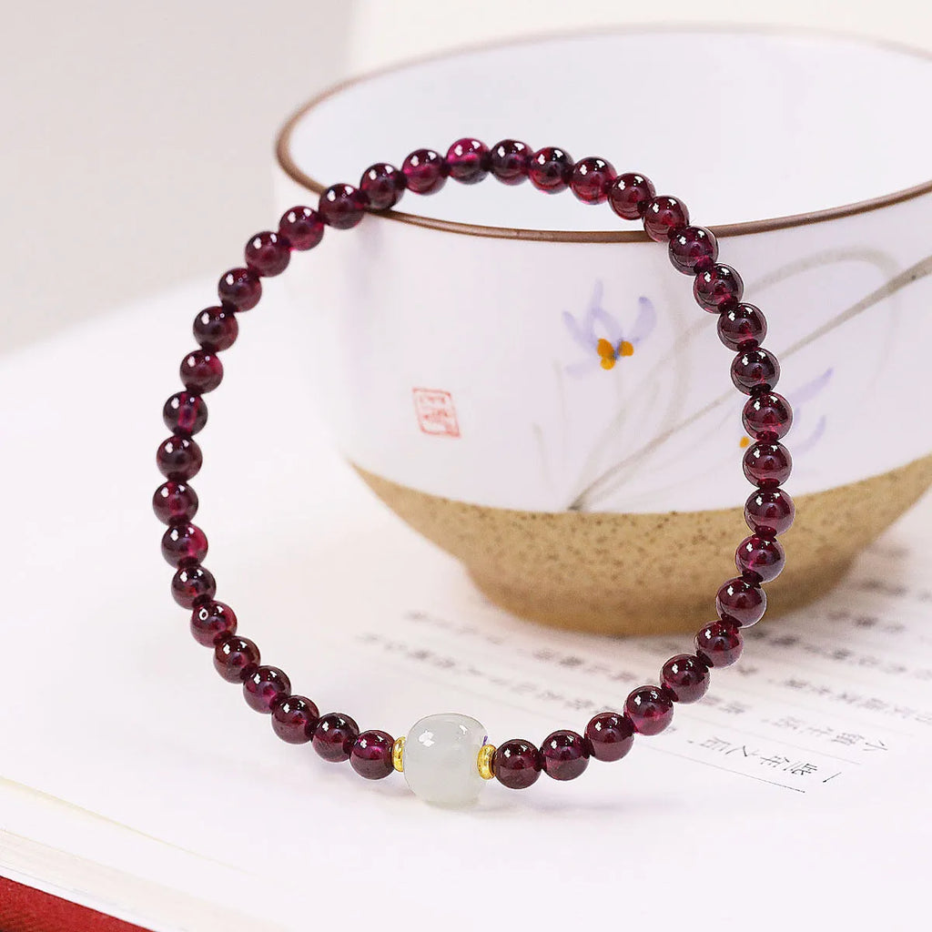Natural garnet bracelet with U-shaped design, available in 4mm or 6mm stone sizes and two colour variations