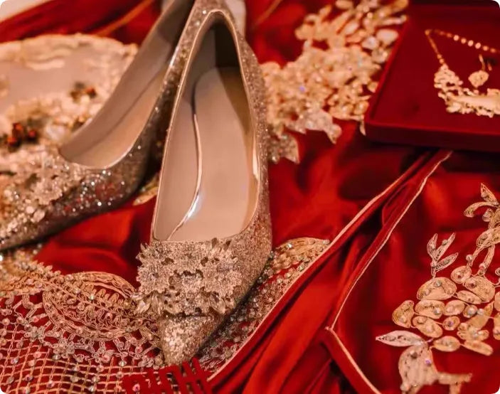 Champagne coloured pointed toe bridal shoes with rhinestone floral pattern on a fine heel.