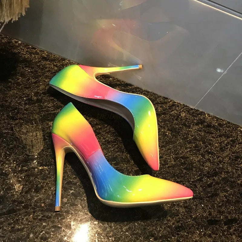 Rainbow patent leather women's high heel shoes with pointed toe and thin heel.