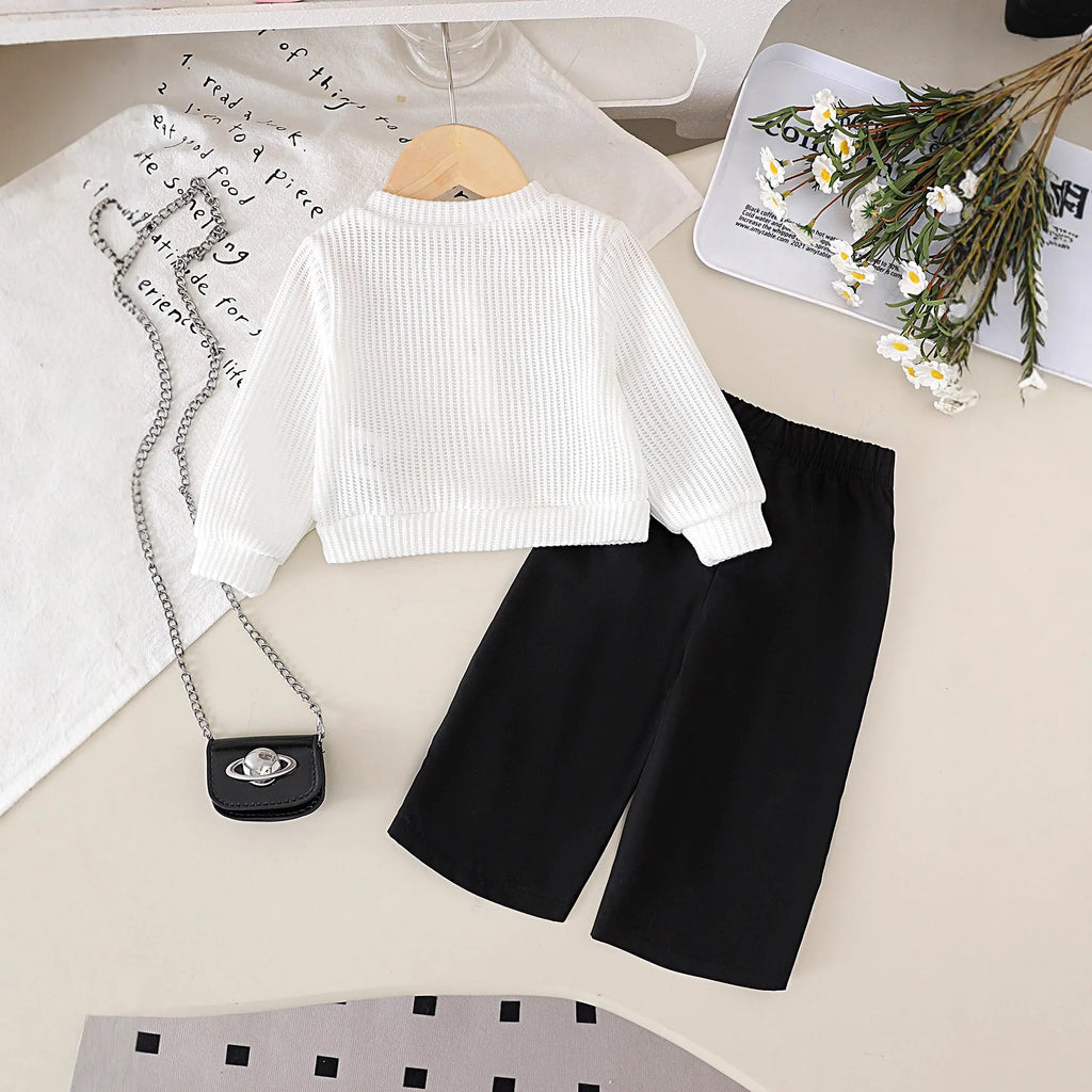 White cotton flower print long sleeve top and black trousers baby outfit set