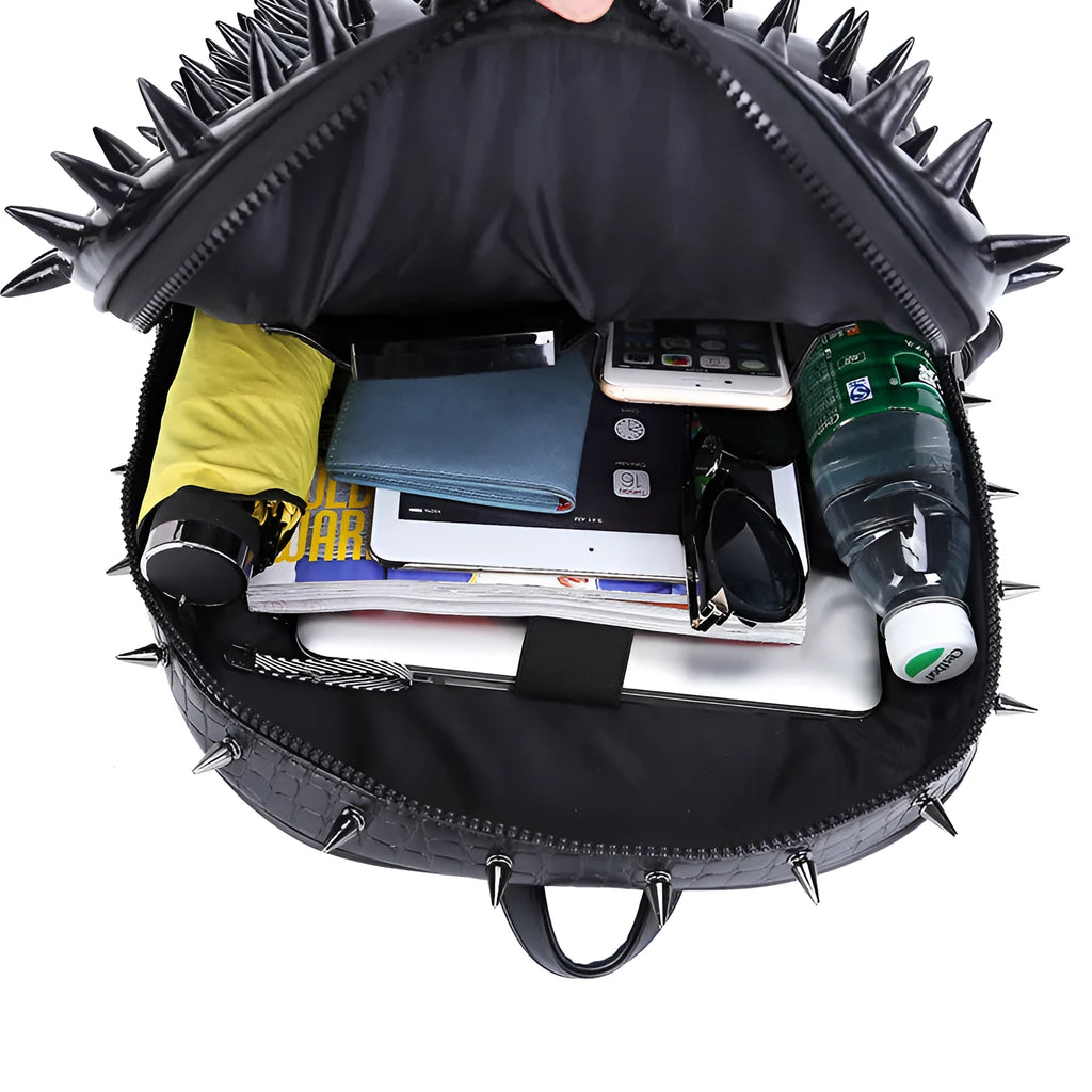 Black punk style women's backpack with air cushion straps and a zippered opening.