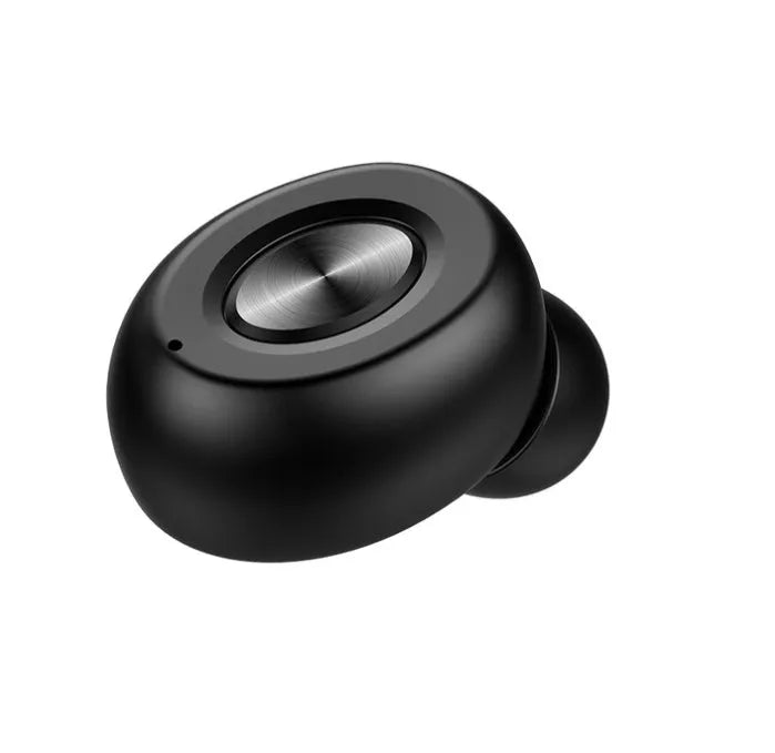 True wireless Bluetooth headset on magnetic car charging base, black colour, with silicone ear caps
