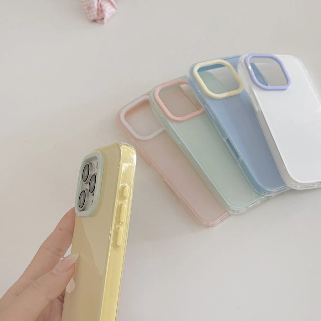 Solid colour transparent TPU jelly phone case for iPhone showing yellow, white, blue, pink, and green options