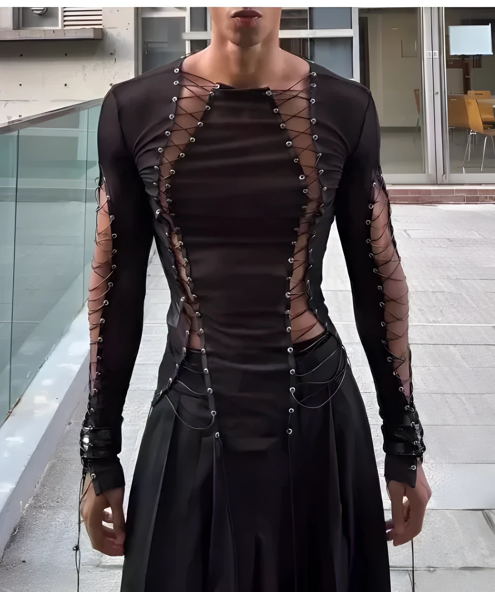 Men's black transparent lace-up mesh top with long sleeves and drawstring hem worn on a model
