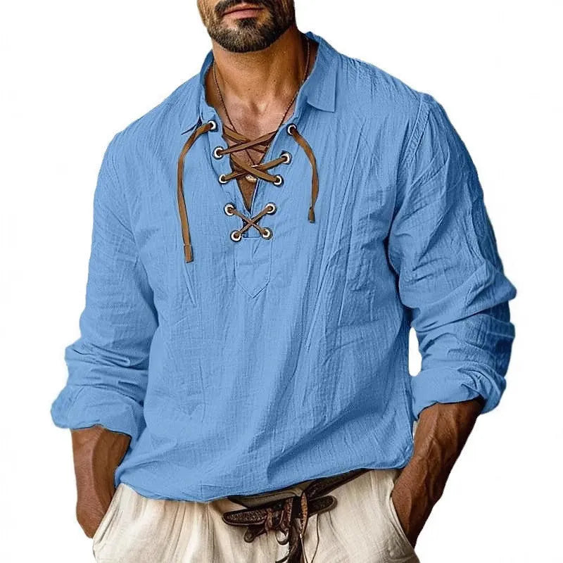 Men's loose blue linen-blend shirt with lapels and long sleeves on a hanger.