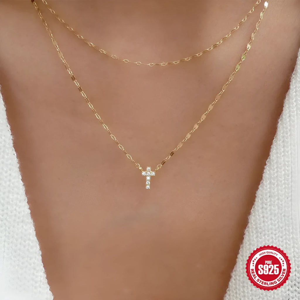 S925 sterling silver necklace with a double layer diamond cross pendant on a clavicle chain.