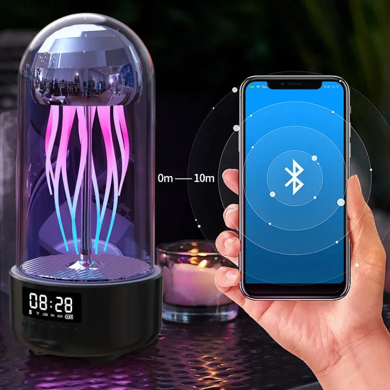 Grey pink purple Bluetooth speaker with jellyfish mood lighting effects and LED clock display screen