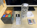 Creative crystal diamond table lamp with rechargeable RGB16 colour touch controls on a bedside table