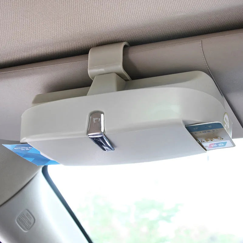 Car glasses case clipped onto sun visor, 170x70x55mm, silver coated tape and steel wire construction