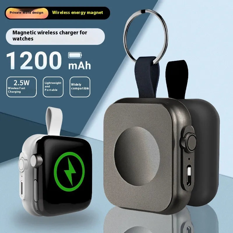 Mini magnetic mobile wireless power supply in black on a table with a smartphone on top