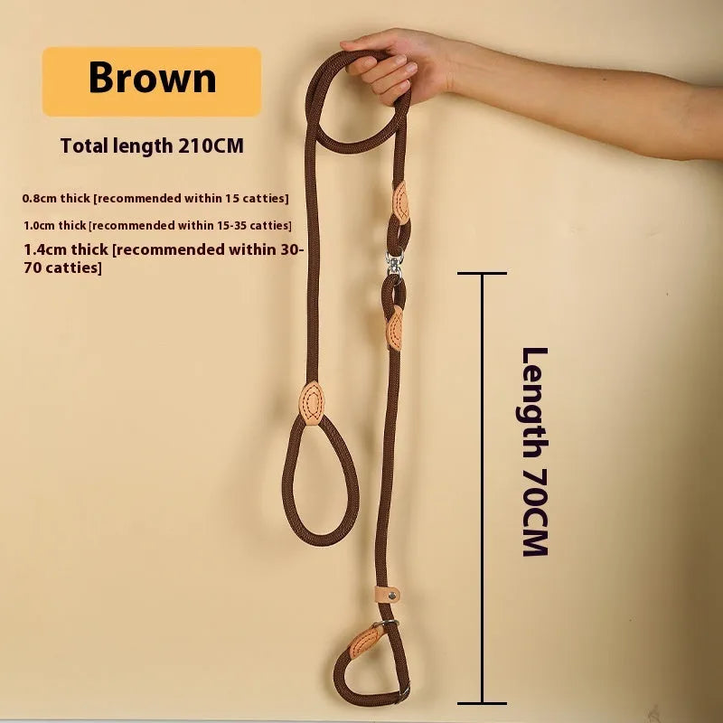 Brown nylon dog leash with hand holding rope and P chain attachment