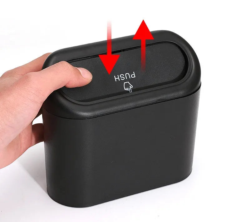 Black ABS plastic car trash can measuring 160x143x85mm with removable hook and upturned lid