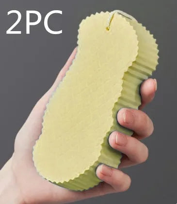 White 3D fish scale pattern bath sponge with hang loop on a bathroom background.