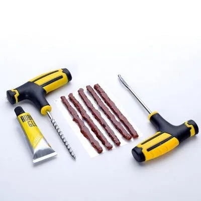 8-piece vacuum tyre repair tool set with rubber strips, glue, and tools for motorcycle and automobile tyres