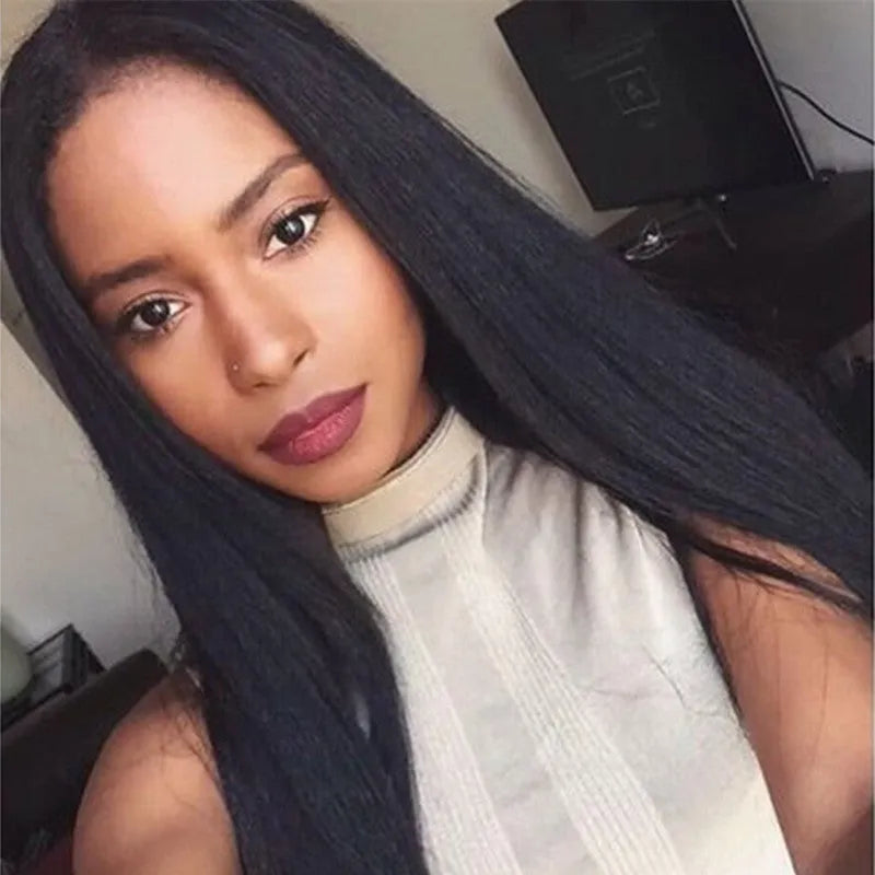 A long straight black synthetic wig with centre-parted bangs, made from high-temperature fibre.