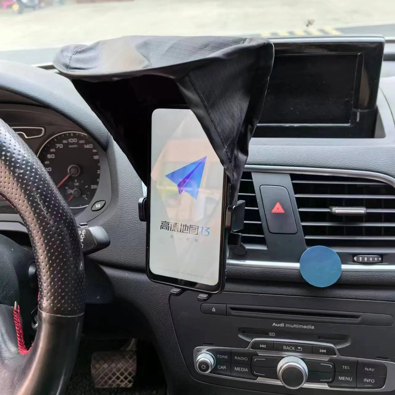Black car phone holder sunshade shield with ribbon side block attached to vehicle air outlet