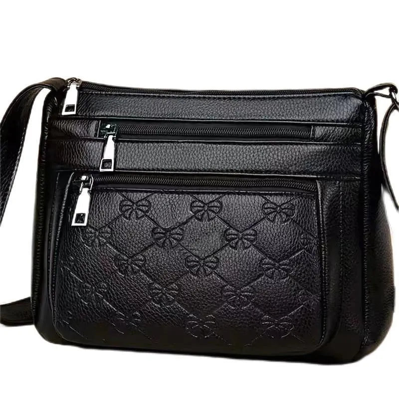 Butterfly black women's crossbody messenger bag with embossed detailing and horizontal square shape