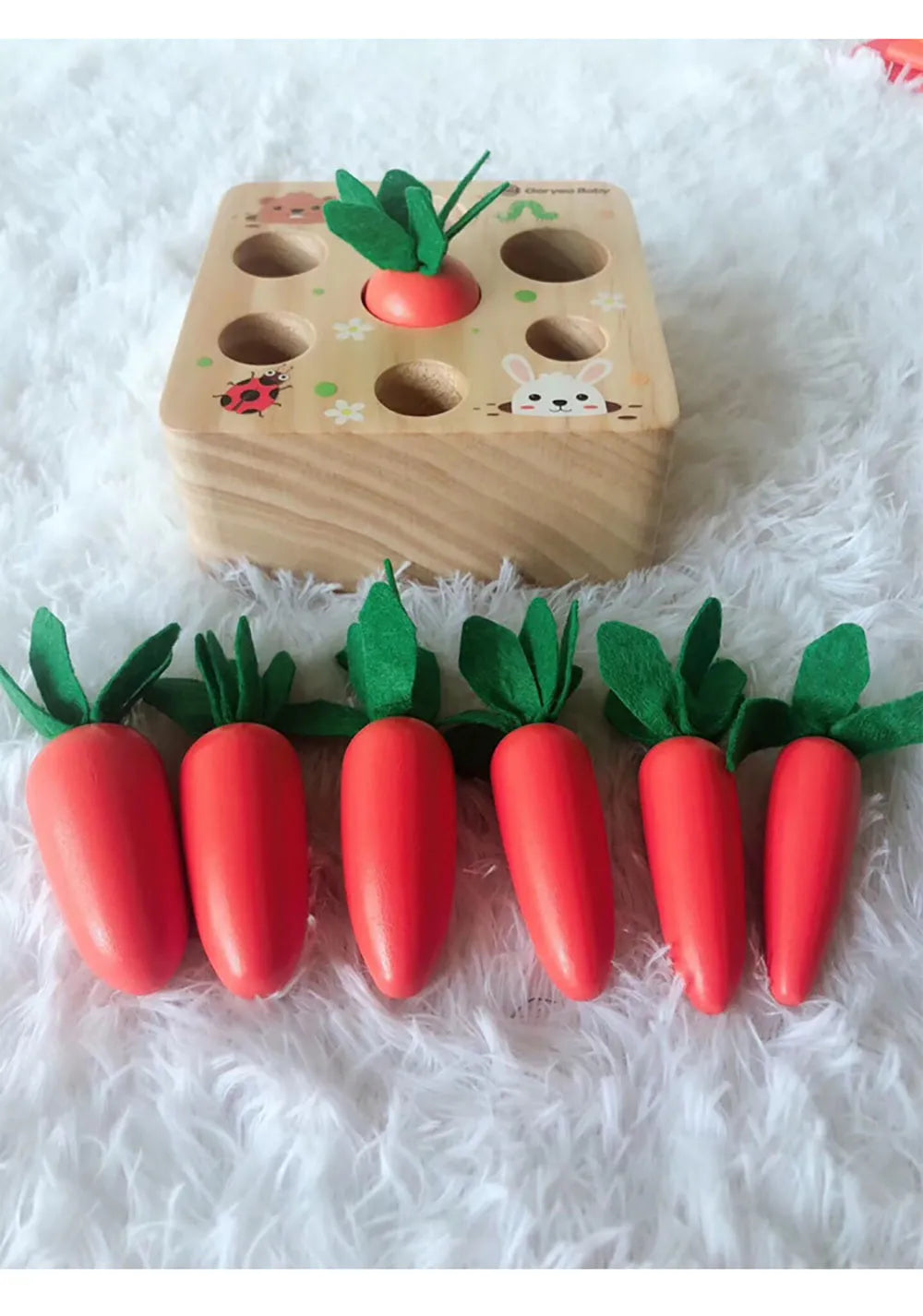 Wooden educational toy shaped like harvest carrots for toddler cognitive development.