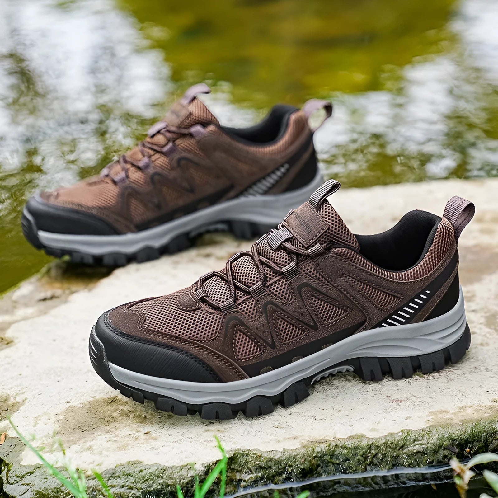 Men's black hiking shoes with low heel, breathable microfiber upper, and wear-resistant sole for camping and running