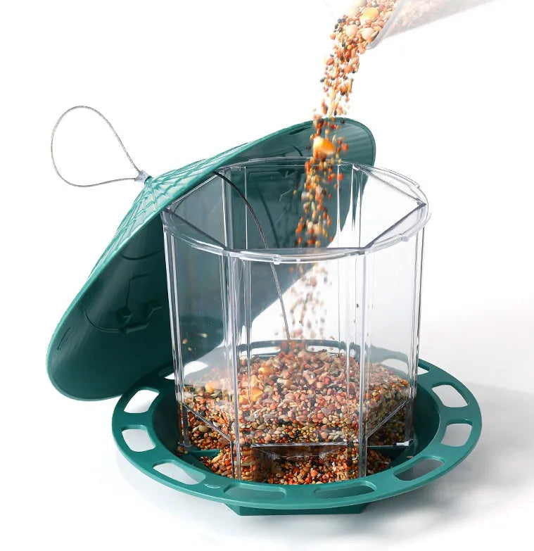 Outdoor garden hanging transparent bird feeder in green PP material with automatic feeding mechanism
