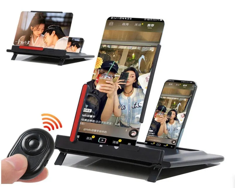 Black 12-inch mobile phone screen amplifier with pull-out stand on a table next to a phone.