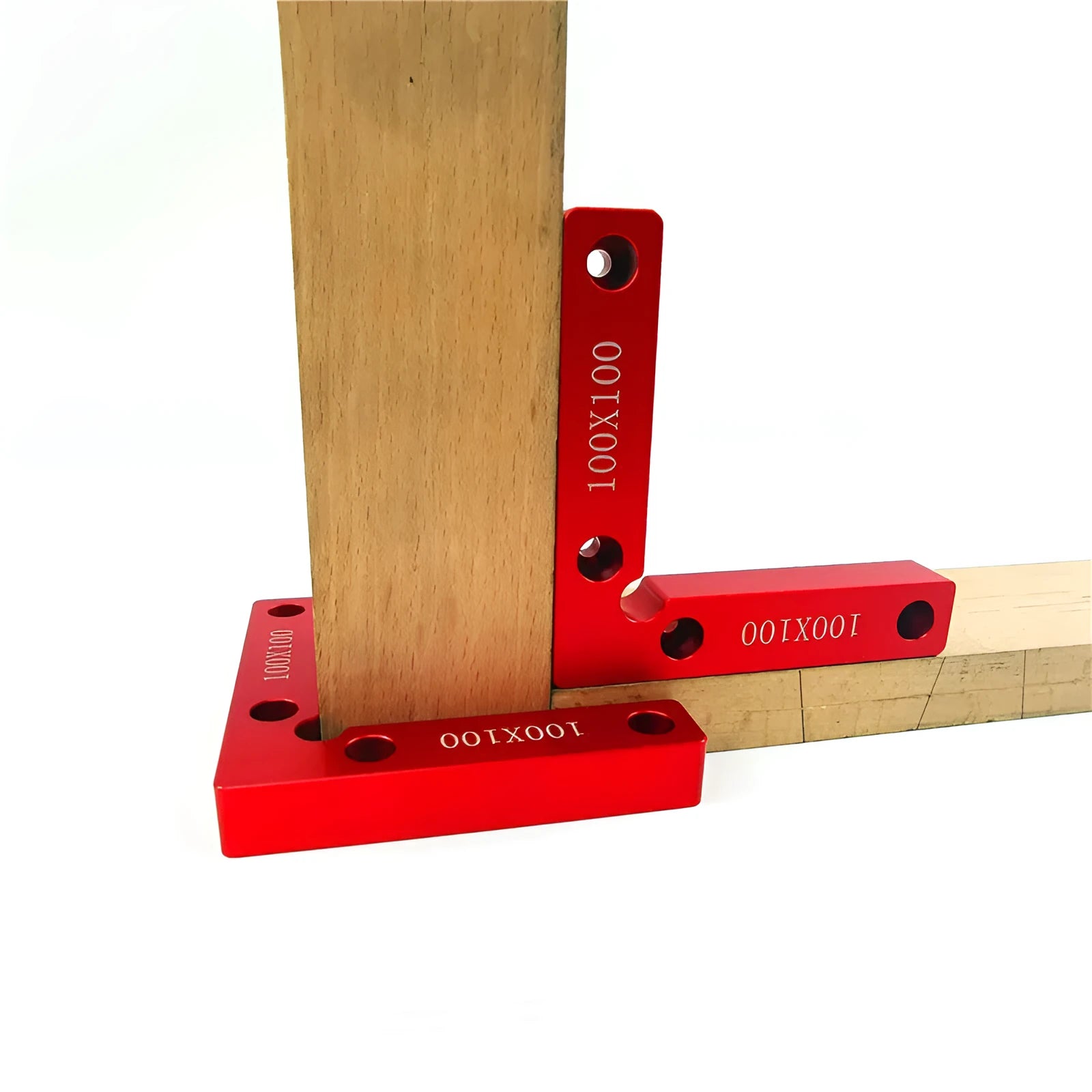 Solid aluminium right angle woodworking positioning block with measurement scale, shown with clamps and jigsaw.