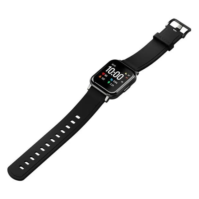 Black waterproof smart bracelet with 1.4-inch screen and silicone strap on a wrist.