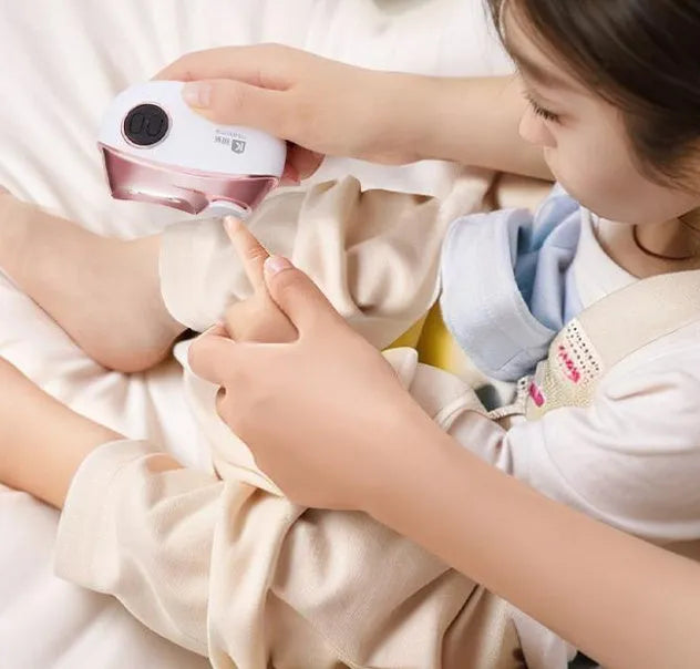 Blue automatic electric nail clipper and polisher tool with USB Type-C charging port and cleaning brush.