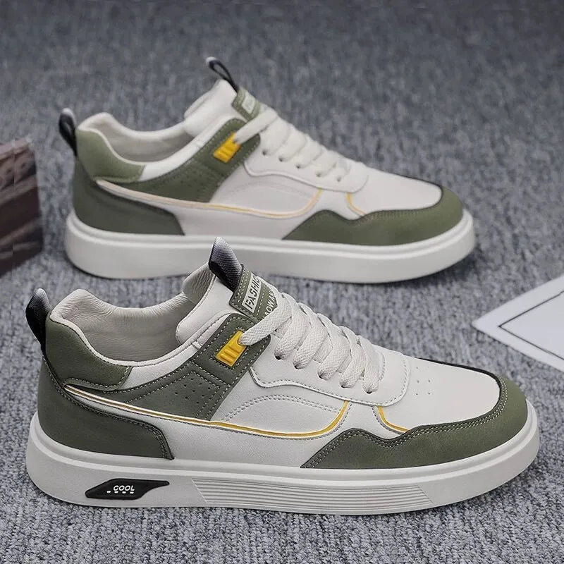 Men's low-top canvas board shoes in grey with leather stitching and mesh lining visible at the collar.