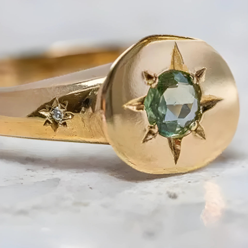 Golden oval ring with adjustable opening and a micro-inlaid star-shaped zircon stone on a zinc alloy band.