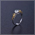 Detailed copper crown ring with crystal accents on a finger, showing black gold and copper finish options.