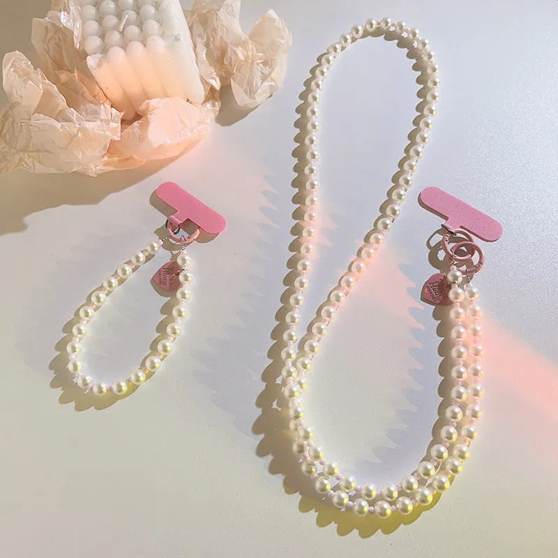 Pink pearl beaded mobile phone lanyard with crossbody long shoelace and short rope wrist strap options, small pink clip.