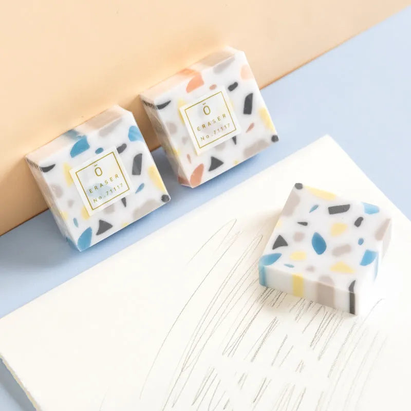 Small white PVC eraser measuring 36mm square with 12mm thickness for portable art drawing use