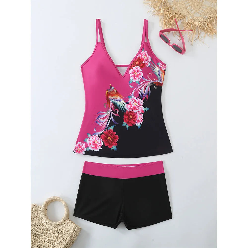 Women's black plus size split print brief swimsuit with a cotton lining.