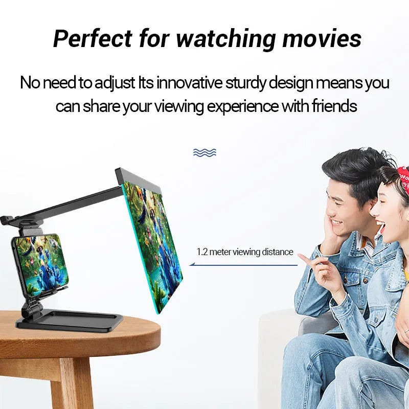Black folding mobile phone screen magnifier and adjustable holder on a desktop.
