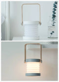 Foldable touch dimmable LED reading lamp in white showing table and lantern configurations