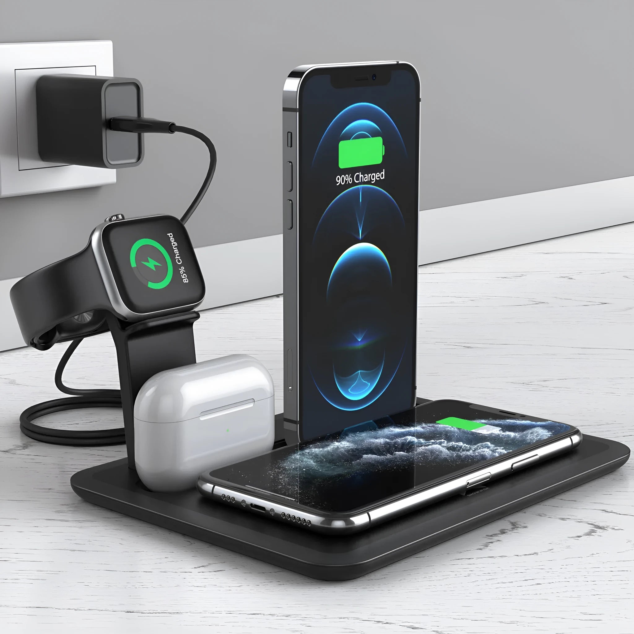 Black desktop wireless charging station with phone on pad, watch and headphone cables plugged in.