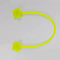 Purple silicone wire winder with magnet holding a coiled white headphone cable.